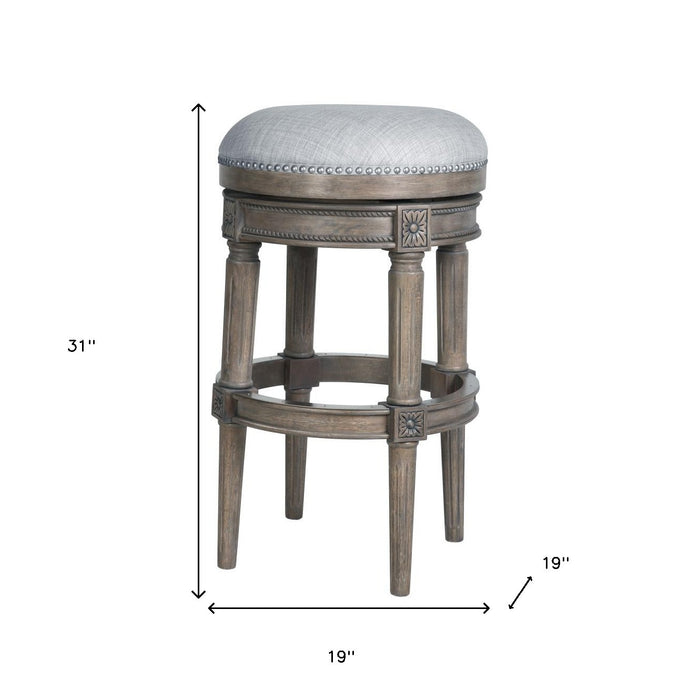 31" Gray Fabric And Solid Wood Backless Bar Height Swivel Bar Chair