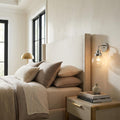 One Light Silver Wall Sconce with Round Glass Shade