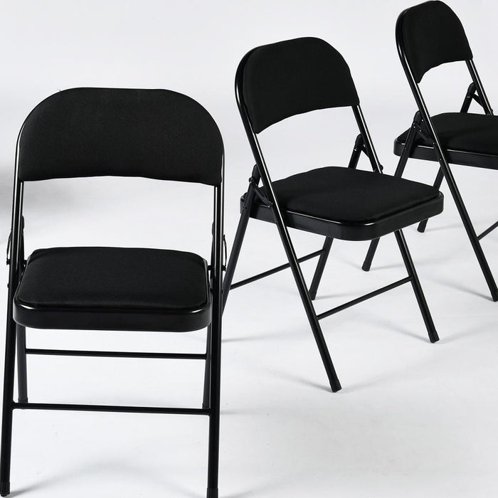 Set of Four Black Faux Leather and Steel Folding Chairs